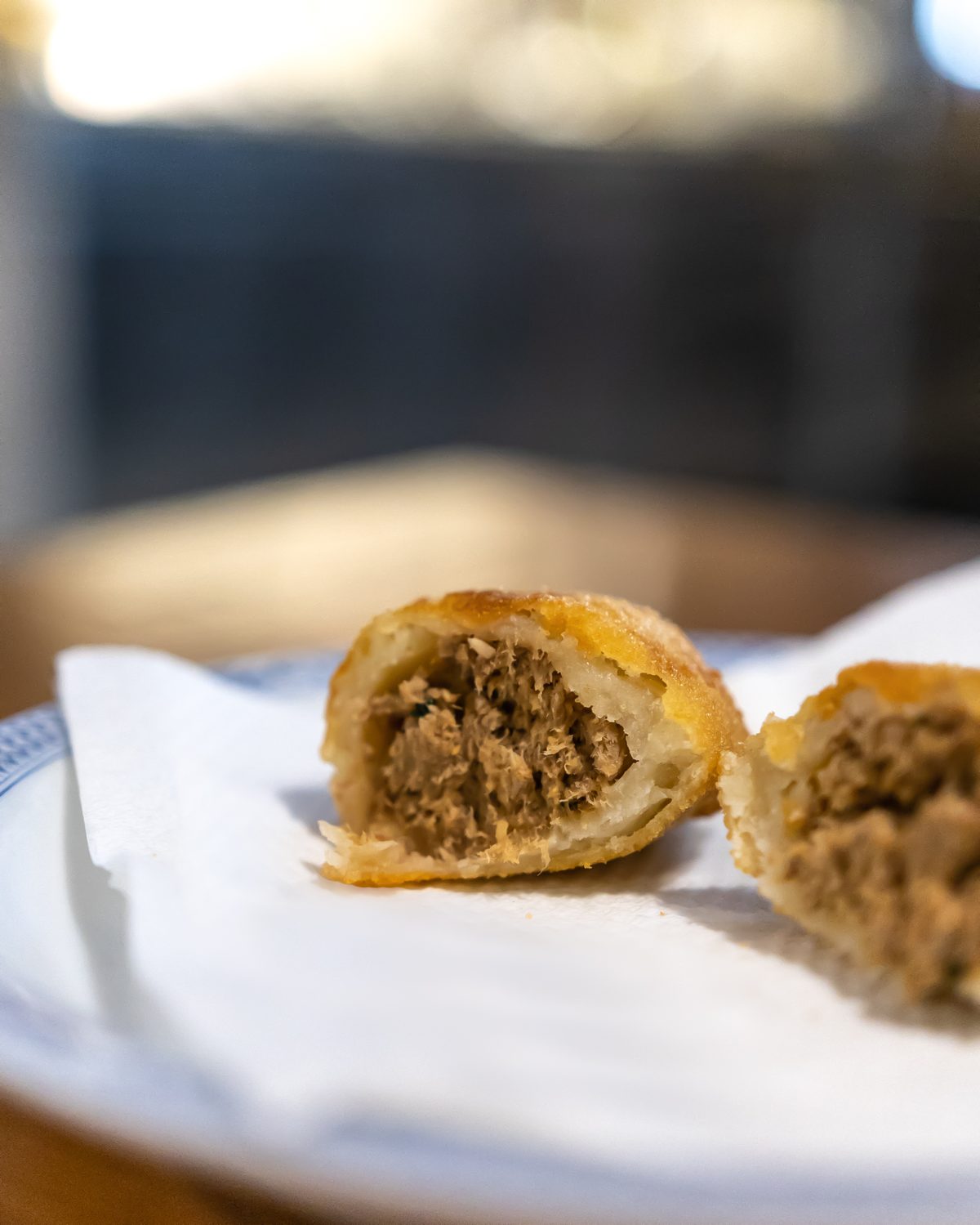 Close-up of a meat rissol interior with shredded sirloin filling