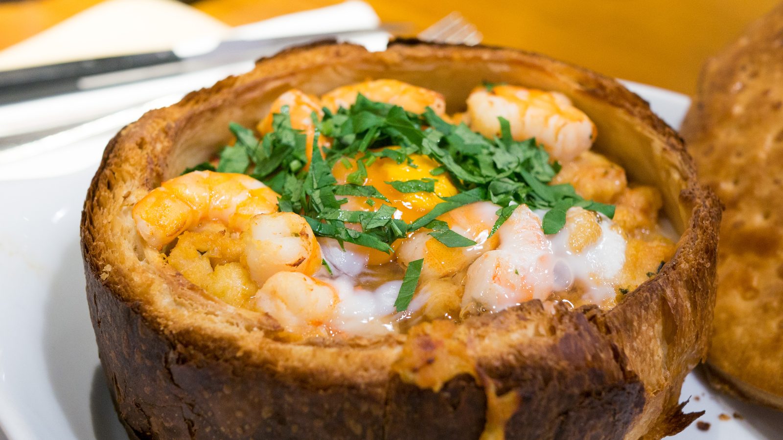 Shrimp açorda in a puff pastry shell, traditional Portuguese food in Porto
